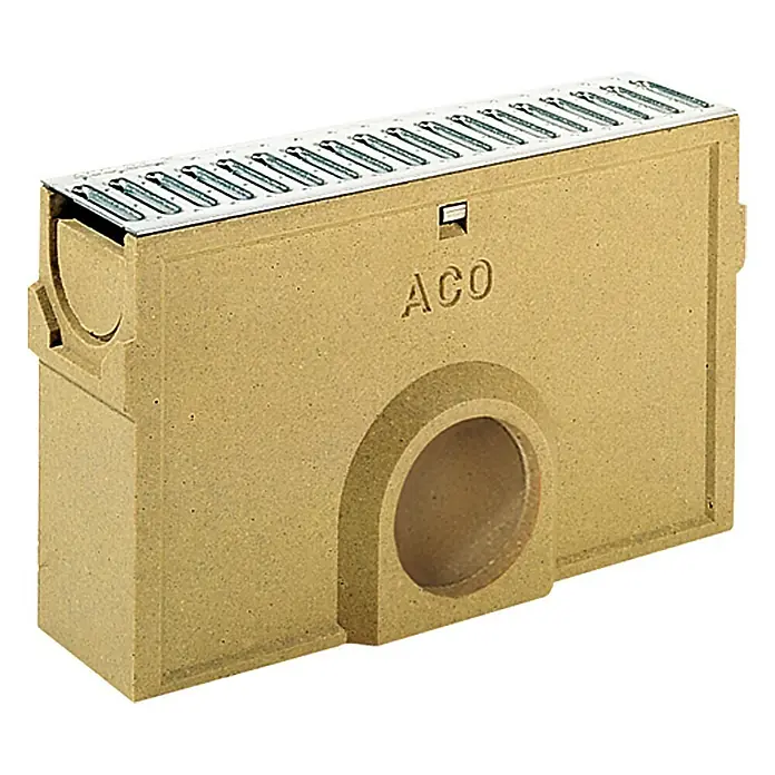 ACO Self Einlaufkasten Standardline - 50 x 11,8 x 30 cm - Nahaufnahme eines ACO-Entwässerungsrinnensystems aus Beton mit Gitterrostabdeckung, ideal für die effiziente Oberflächenentwässerung.