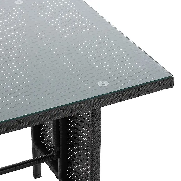 SVITA Loungemöbel-Set MONROE - 4 -tlg., Polyrattan, Schwarz - Nahaufnahme eines dunkelgrauen Rattantisches mit einer klaren Glasplatte, gesichert durch Saugnäpfe.