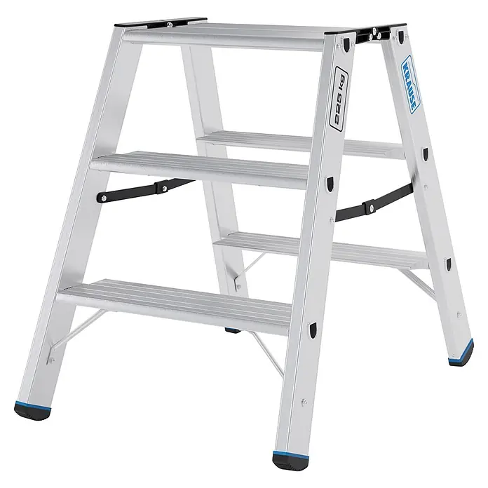 Krause Doppel-Klapptritt 2X3 Stufen - Anzahl Tritte: 6 Stk., Belastbarkeit: 225 kg, Aluminium - Silberne Aluminium-Klappleiter mit drei breiten Stufen, schwarzen Streben und blau-schwarzen Fußkappen.