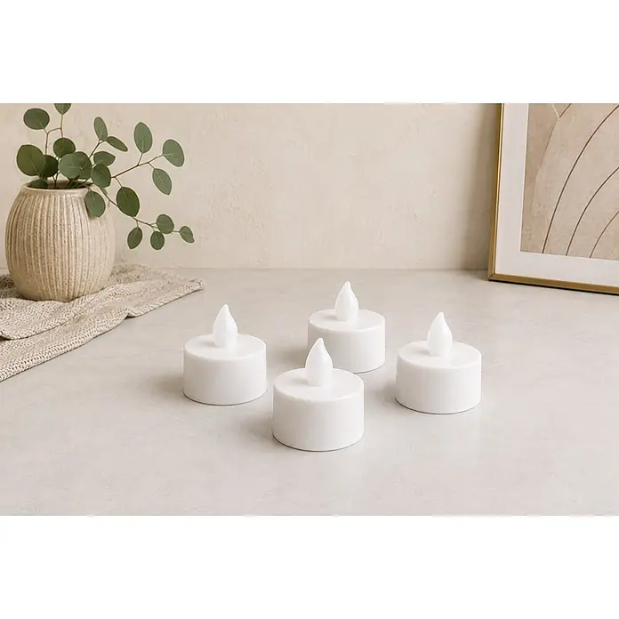 LED-Teelicht Nele - 4 Stk., Weiß, Ø x H: 3,8 x 3,5 cm - Vier weiße flammenlose LED-Kerzen angeordnet, bereit für sicheres Ambiente.