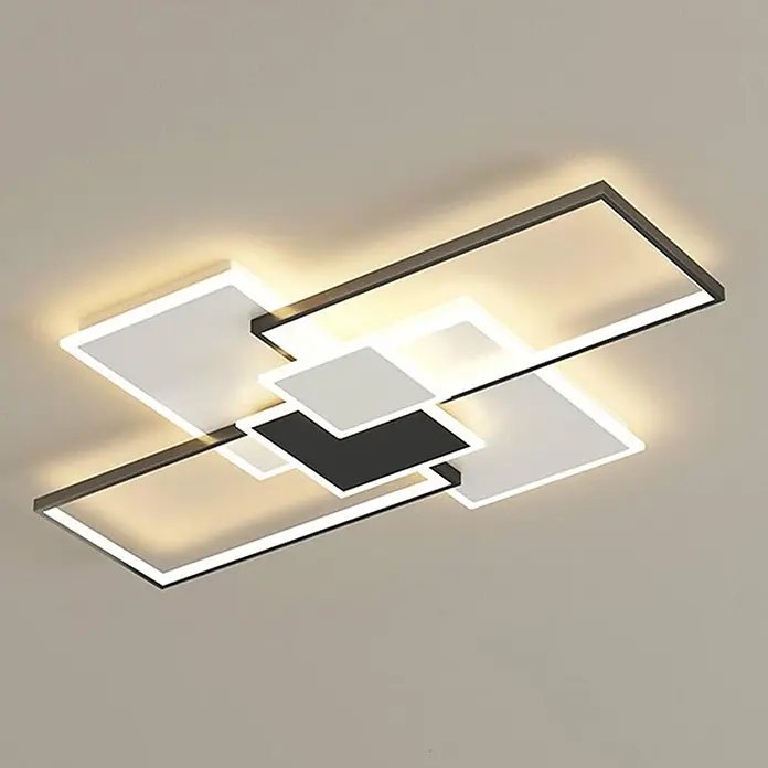 Panaled Plafón LED Osaka - 120 W, Negro / Blanco, Blanco neutro - Moderna lámpara de techo LED geométrica con elementos rectangulares blancos y negros, emitiendo luz cálida.
