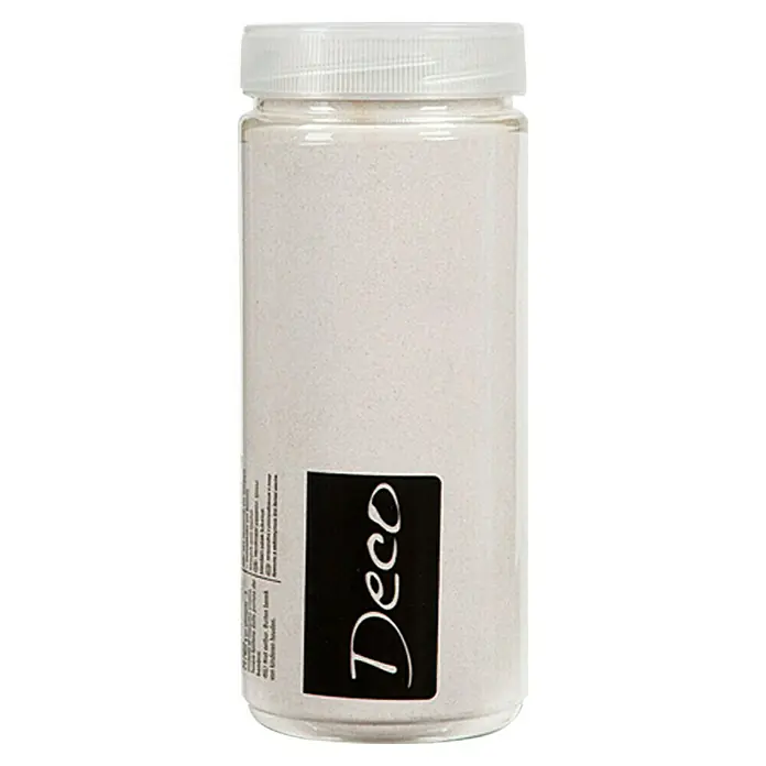 Dekosand -  - Nahaufnahme einer Dose Deco-Dekorsand, ideal zum Basteln und Dekorieren. Der Sand hat eine feine Textur und eine sanfte, natürliche Farbe.
