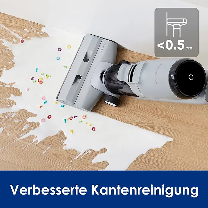 Tineco Akku-Nass-Trockensauger iFLOOR 5 Breeze - Akkulaufzeit: 35 min, Wassertankvolumen: 0,8 l - Grauer Bodenreiniger entfernt verschüttete Milch und Müsli am Bodenrand, zeigt verbesserte Kantenreinigung bis 0,5 cm an Wänden.