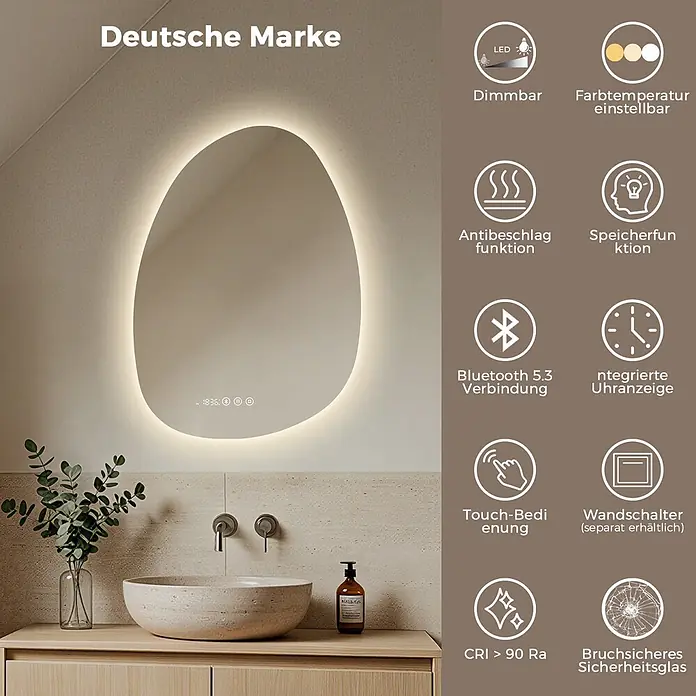 LED Badspiegel 60 x 45 cm, asymmetrisch, 3 Lichtfarben, dimmbar, Bluetooth -  - Asymmetrischer, hinterleuchteter Spiegel mit Smart-Funktionen wie Uhr, Bluetooth und Touch-Steuerung, in einem Badezimmer über einem Waschbecken.