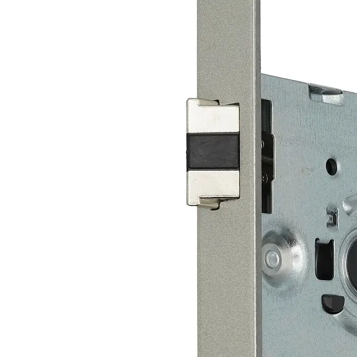 Bever Einsteckschloss mit Flüsterfalle - WC-Verriegelung, Dornmaß: 55 mm, Links, Stulpbreite: 24 mm, Stulpform: Eckig - Silberner Türschlossmechanismus mit weißem und schwarzem Riegel.
