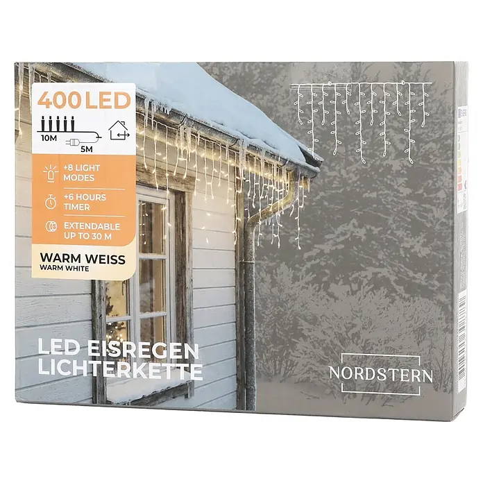 Nordstern LED-Lichterkette Eisregen Verlängerung - Außen, Lichtfarbe: Warmweiß, Anzahl Leuchtmittel: 400 Stk., Netzbetrieben - Nordstern 400 LED Eisregen Lichterkette in warmweiß, erweiterbar bis 30m, mit 8 Modi und Timer, an schneebedecktem Haus gezeigt.
