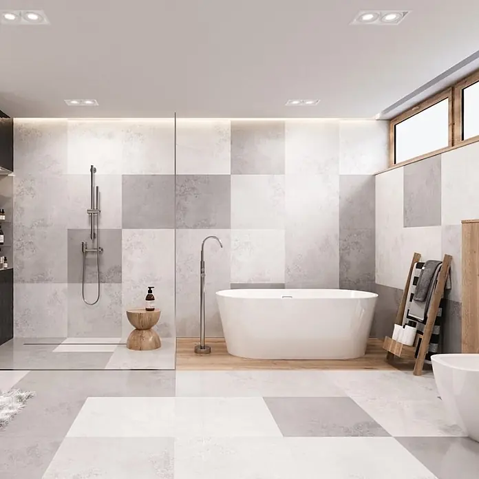 Bad Land Badewannenstandarmatur LUGO freistehende Badewannenarmatur Chrom - Chrom, Matt - Modernes Badezimmer mit begehbarer Dusche, freistehender Badewanne und grau-weißen Schachbrettfliesen an Wänden und Boden.