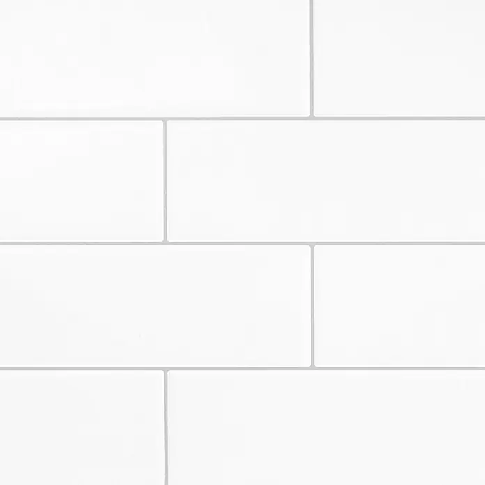 Smart Tiles Selbstklebemosaik Oslo - 57,31 x 27,62 cm, White, Glänzend - Weiße rechteckige Fliesen mit hellgrauen Fugen.