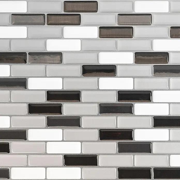 Smart Tiles Selbstklebemosaik Murano - 25,92 x 23,11 cm, Metallic, Glänzend - Glänzende selbstklebende Fliesen in Weiß, Hellgrau, Dunkelgrau und Schwarz, im Ziegelmuster mit 3D-Effekt.