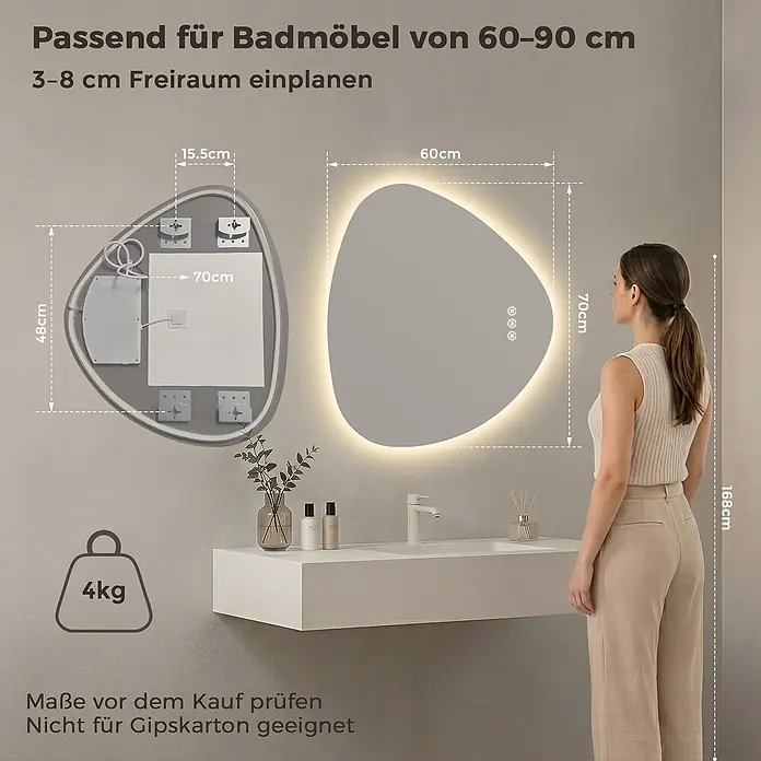 LED Badspiegel dreieckig 60 x 70 cm, 3 Lichtfarben, dimmbar, Memory -  - Asymmetrischer LED-Badezimmerspiegel mit beleuchteten Kanten und Touch-Steuerung, mit Maßen und einer Person zur Größenreferenz.