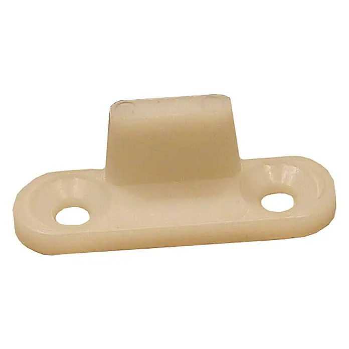 HBS Betz Bodenführung - 15 x 13 mm, 2 Stk. - Nahaufnahme eines beigen Kunststoff-Gleiters mit zwei Löchern für Schrauben, der für Möbel oder Schubladen verwendet wird.