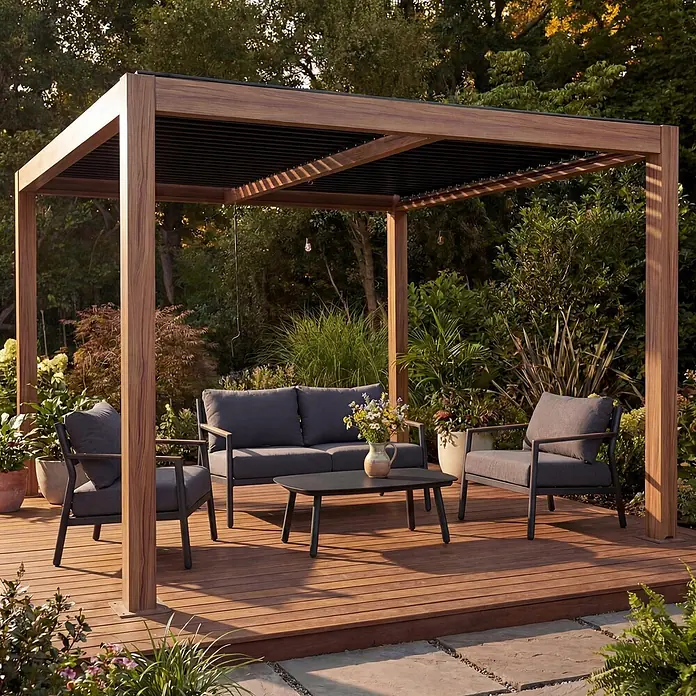 Pergola | HxBxT 220x400x300cm | Gartenpavillon Lamellen-Pavillon | Holzoptik | 10cm-Aluminium-Gestell | Regenrinne sturmfest -  - Holzoptik-Pergola mit schwarzem Lamellendach über dunkelgrauer Outdoor-Sitzgruppe und Couchtisch auf Holzterrasse im Garten.