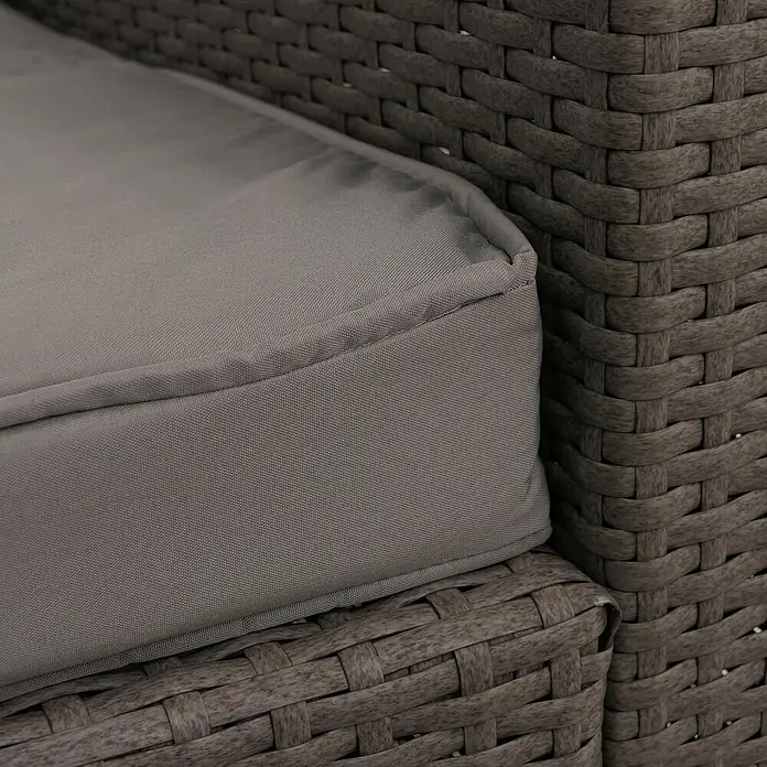 Mendler Poly-Rattan Garnitur HWC-O46 - grau Polster hellgrau -  - Nahaufnahme eines grauen Kissens auf grauen geflochtenen Outdoor-Möbeln.
