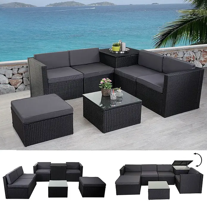Poly-Rattan-Garnitur | Balkon-/Garten-/Lounge-Set Sofa Sitzgruppe | Box Staufach | Anthrazit | Kissen Dunkelgrau -  - Schwarze Rattan-Gartenlounge mit grauen Kissen, L-förmig auf einer Terrasse. Mit Hocker, Glas-Couchtisch und Stauraum.