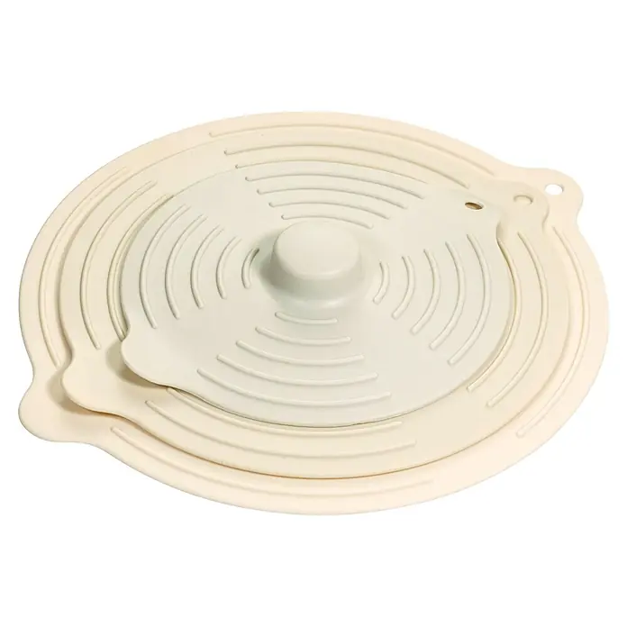 Wenko Deckel Silia - Silikon, Beige, 3 Stk. - Gestapelte Garnitur aus drei hellbeigen Silikon-Lebensmittelabdeckungen mit konzentrischen Rillen und zentralem Griff, für diverse Behältergrößen.