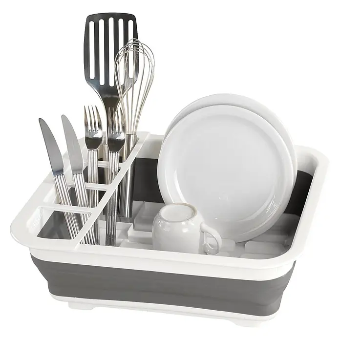 Wenko Abtropfgestell - L x B x H: 36,5 x 31 x 13 cm, Kunststoff - Graues und weißes klappbares Abtropfgestell mit weißen Tellern, einer Tasse und silbernem Besteck.