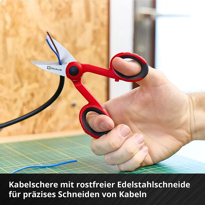 Einhell Werkzeugkoffer E-Case Hobby - 153 -tlg. - Hand schneidet elektrische Kabel mit roten/schwarzen Einhell Kabelscheren mit Edelstahlschneide.