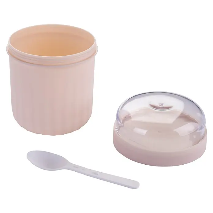 Fackelmann Lunchbox Pamela Reif Kollektion - Rosa - Hellrosa Plastik-Lunchbox mit transparentem Deckel und weißem Löffel.