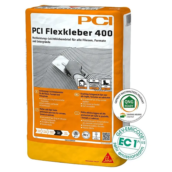 PCI Flexkleber 400 15 kg C2TES1 - 15 kg - Ein orange-weißer Sack PCI Flexkleber 400, ein Hochleistungs-Leichtklebemörtel für Fliesen.