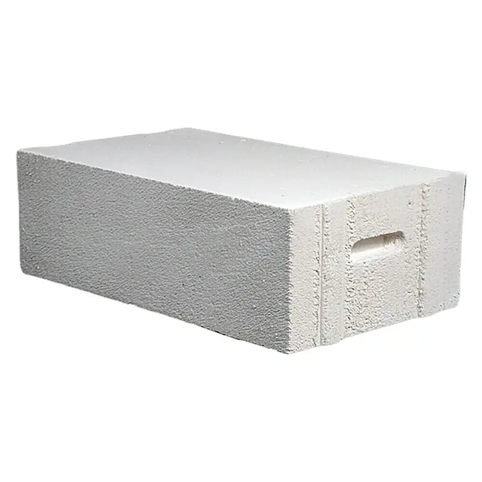 Porenbetonstein PP2 - 60 x 36,5 x 19,9 cm, Druckfestigkeit: Klasse 2, Rohdichte: 0,4 kg/dm³ - Aufnahme eines Porenbetonsteins, der für Bauprojekte verwendet wird, mit einer glatten Oberfläche und einer Griffaussparung.