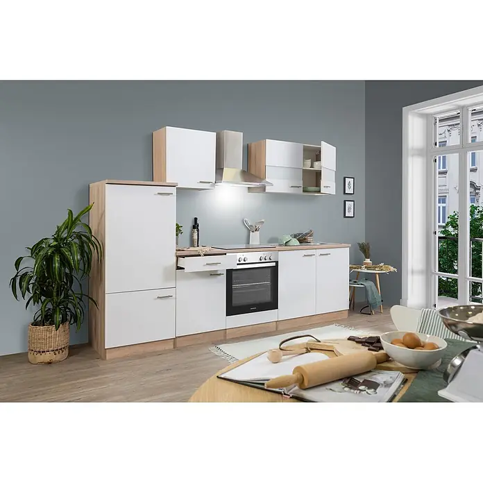 Respekta Singleküche Merle Typ 1 - Breite: 270 cm, Weiß, Mit Elektrogeräten, Volumen Backofen: 72 l - Moderne Küchenzeile mit weißen Fronten und hellen Holzdekoren, ausgestattet mit Backofen, Kochfeld, Spüle und Stauraum, in einem modernen Raum.
