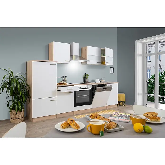 Respekta Küchenzeile Merle Typ 1 - Breite: 280 cm, Weiß, Mit Elektrogeräten - Moderne weiße und helle Eichenküchenzeile mit integriertem Backofen und geöffnetem Geschirrspüler.