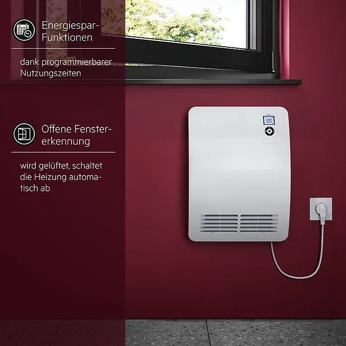 AEG Heizlüfter Bad VH Comfort Wandmontage - 2.000 W, Alpinweiß, IP24 - Weißer Elektro-Konvektor mit Digitalanzeige (20.0), an roter Wand neben Fenster montiert und eingesteckt. Text weist auf Energiesparfunktionen hin.