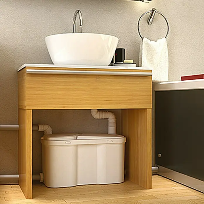 Setma Haushaltspumpe Watersan 4Max. Förderhöhe: 6 m, Max. Förderweite: 60 m, 500 W - Badezimmer mit einem eleganten Waschbecken auf einem Holzunterschrank, darunter eine sanitäre Hebeanlage für zusätzlichen Komfort.