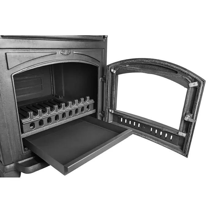 Estufa de leña con horno Antares - 12,7 kW - 16,28 kW, Volumen de calefacción: 305 m³, Antracita - Interior abierto de estufa de leña de hierro fundido gris oscuro con cenicero extraíble y parrilla.