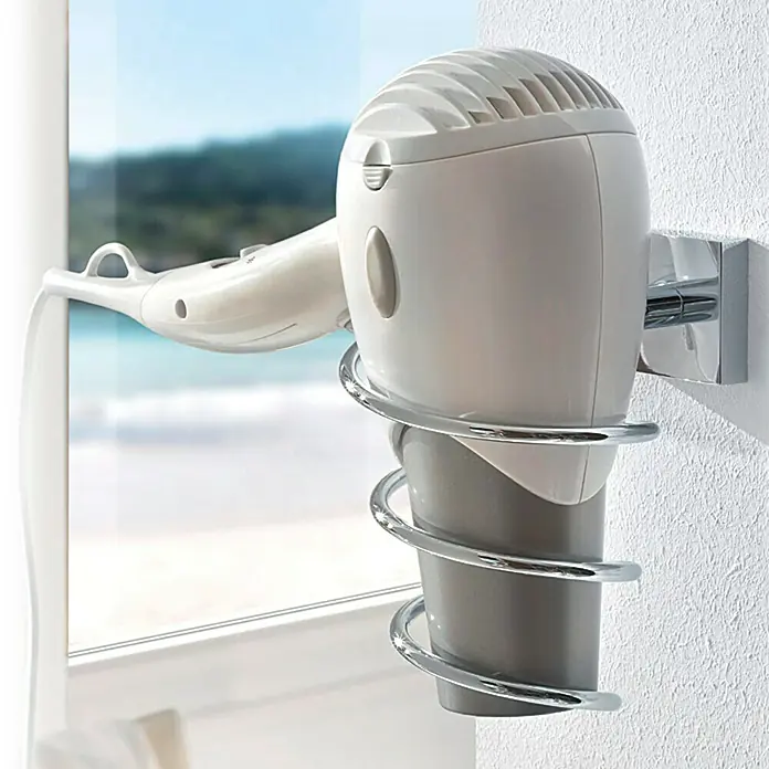 Tesa Ekkro - Cromo - Un elegante soporte para secador de pelo cromado en forma de espiral, montado en la pared, que sujeta el secador perfectamente.