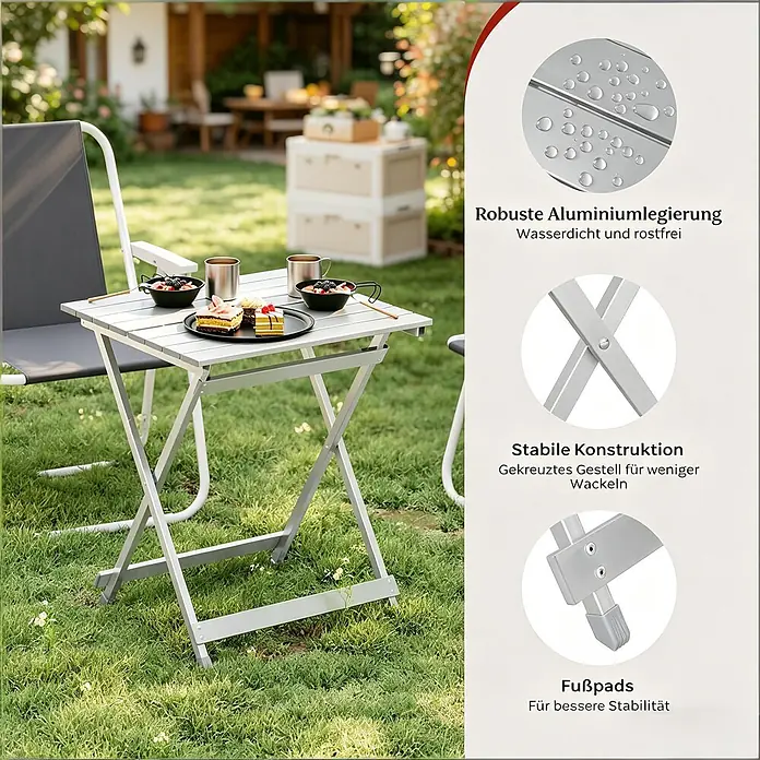 SONNENH Balkontisch klappbar 50,5 x 46,5 x 60 cm Silber aus Aluminium -  - Grauer Klapptisch aus Aluminium mit überkreuzten Beinen im Gras, mit Snacks und Getränken gedeckt, neben einem Stuhl.