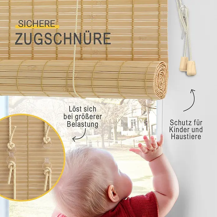 Sol Royal Rollo - B x H: 90 x 160 cm, Natur, Uni - Natürliches Bambusrollo mit kindersicheren Abreißschnüren und Holzknebeln, gezeigt mit Baby am Fenster zur Hervorhebung der Sicherheitsmerkmale.