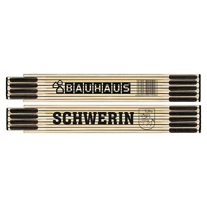 BAUHAUS Zollstock - Schwerin, 2 m - Zollstock mit den Aufdrucken "Bauhaus" und "Schwerin". Das Produkt ist aus Holz gefertigt und zeigt Logos und Schriftzüge.