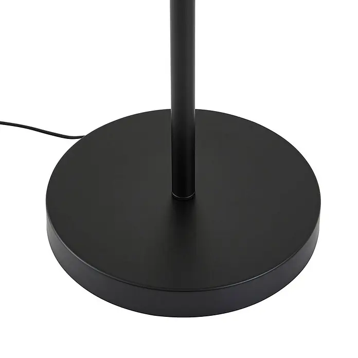 Lindby Stehlampe Wohnzimmer in schwarz, creme, Stehleuchte -  - Schwarzer, runder Lampenfuß mit Mittelsäule und Stromkabel. Aus Metall gefertigt.