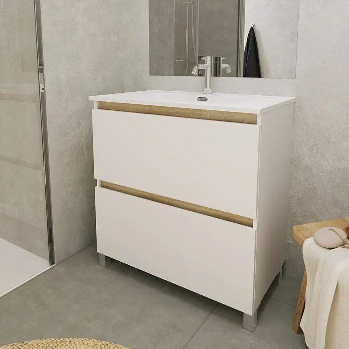 Conjunto de mueble de baño Eli - Ancho total del mueble de baño: 80 cm, Blanco, Mate, 2 pzs. - Mueble de baño blanco con ribete de madera y dos cajones, sobre patas cromadas bajo un lavabo en un baño moderno.