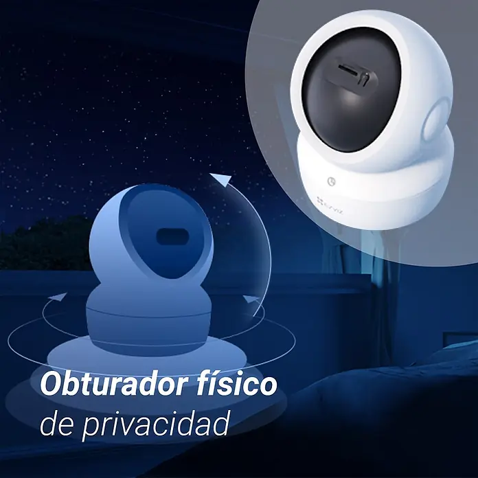 EZVIZ Cámara de vigilancia H6C - Blanco, Ángulo de detección: 360 °, Alcance de detección: 10 m - Cámara de seguridad blanca con obturador físico de privacidad, mostrada en un ambiente hogareño oscuro.