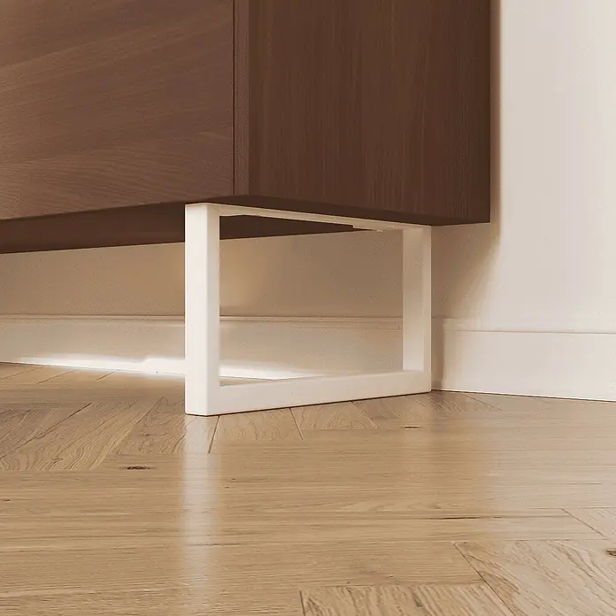 HEVVA Möbelfuß-Set GRAZ - L x B x H: 30 x 3 x 15 cm, Metall, 2 Stk. - Weißes, U-förmiges Metallbein, das einen dunklen Holzschrank auf Parkettboden stützt.