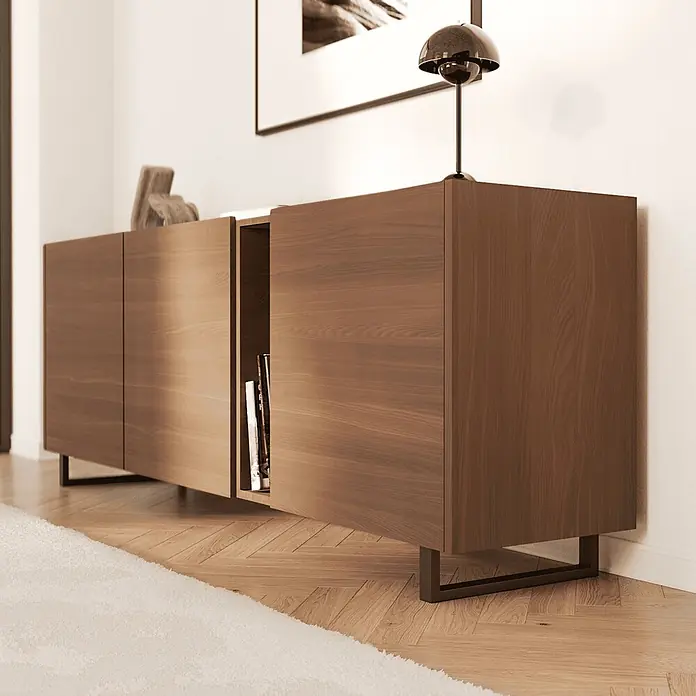 HEVVA Möbelfuß-Set GRAZ - L x B x H: 20 x 3 x 10 cm, Metall, 2 Stk. - Modernes braunes Sideboard aus Holz mit Metallbeinen im Wohnzimmer, eine Tür leicht geöffnet mit Büchern, eine Lampe darauf.