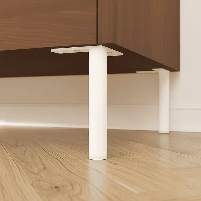 HEVVA 4x Möbelfüße - LINZ - Höhe 10 cm, Rund, Weiß -  - Weiße zylindrische Möbelbeine, die einen dunklen Holzschrank stützen.
