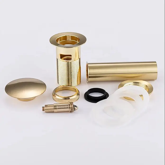 Hudor Spültischarmatur Pénée - Seidenmatt - Demontierter goldfarbener Messing-Pop-up-Waschbeckenstöpsel mit allen Komponenten, Dichtungen, Hauptkörper, Pop-up-Mechanismus und Ringen.