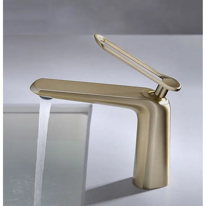 Hudor Waschtischarmatur Scamandre 7697 - Seidenmatt - Moderner Einhebel-Wasserhahn aus gebürstetem Gold, der Wasser in ein Waschbecken leitet.