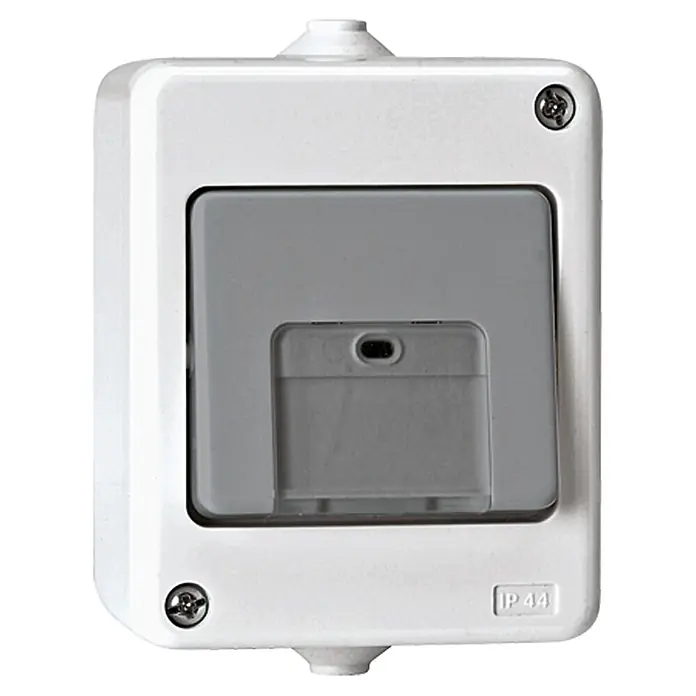 Voltomat FLUID Pulsador para estancias con humedad - Gris, IP44 - Primer plano de una caja de interruptor de superficie a prueba de salpicaduras con un interruptor gris y protección IP44, ideal para lugares húmedos y exteriores.