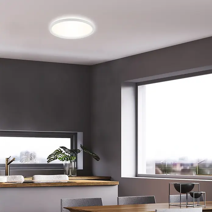 Brilo Plafón LED redondo Slim Case - 18 W, Ø x Al: 29 x 3 cm, Blanco, Blanco neutro - Plafón LED redondo blanco que ilumina un área de cocina/comedor moderna.