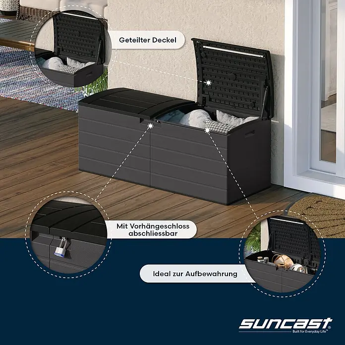 Suncast Auflagenbox - 150 x 61 x 64 cm, Kunststoff, Anthrazit, Geteilter Deckel - Dunkelgraue Outdoor-Aufbewahrungsbox mit geteiltem Deckel, teilweise geöffnet mit Kissen darin, auf einer Holzterrasse.