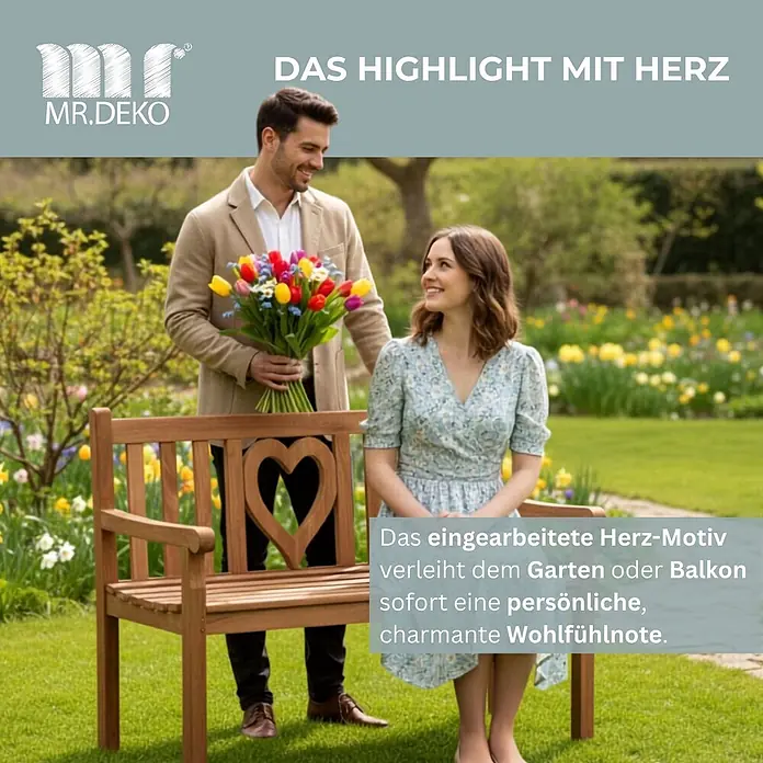Bene Living Gartenbank Herz - Teakholz, Natur - Gartenbank aus Holz mit Herzmotiv in der Rückenlehne. Eine Frau sitzt darauf in einem Garten.