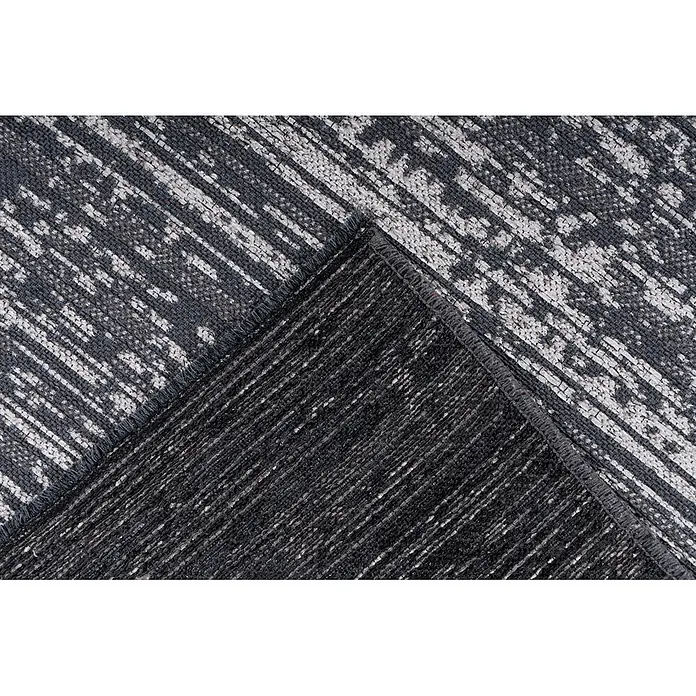 Kayoom Flachgewebeteppich Kalea 125 - Grau, 170 x 120 cm, 100 % Polyester - Ein dunkelgrauer und hellgrauer gemusterter Webteppich, gefaltet, um seine strukturierte Oberfläche und Unterseite zu zeigen.