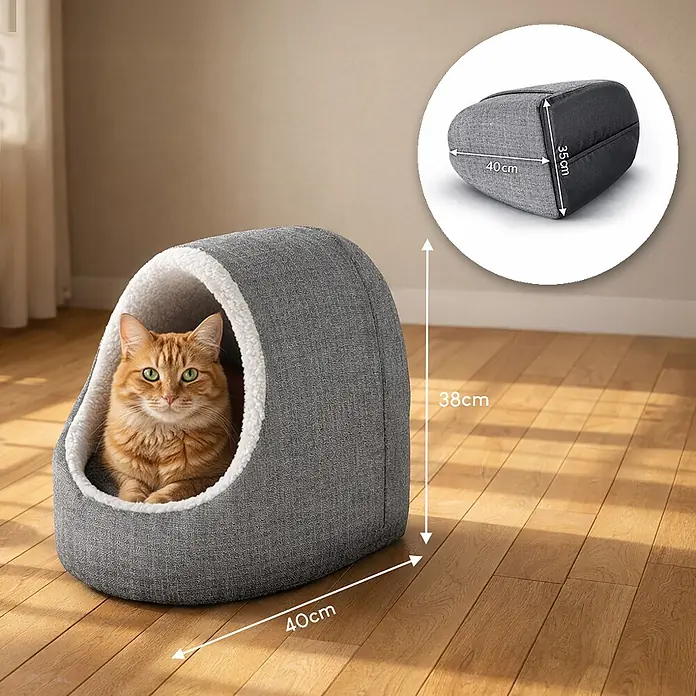 belviona Haustierbett - 40 x 35 x 38 cm, Polyester, hellgrau - Graues Stoff-Katzenhaus mit flauschigem Innenfutter, orange Katze sitzt darin. Misst 40cm breit, 38cm hoch.