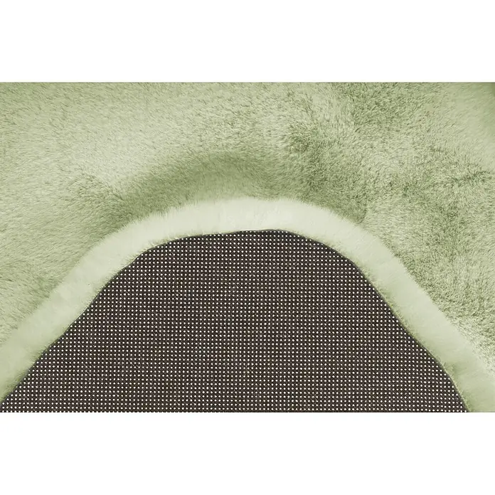 Kayoom Kunstfell Rabbit Double Sheepskin - Mint, 180 x 60 cm, 100 % Polyester - Heller, flauschiger, grüner Teppich, der seine dunkelgraue, rutschfeste Rückseite mit weißen Noppen zeigt.