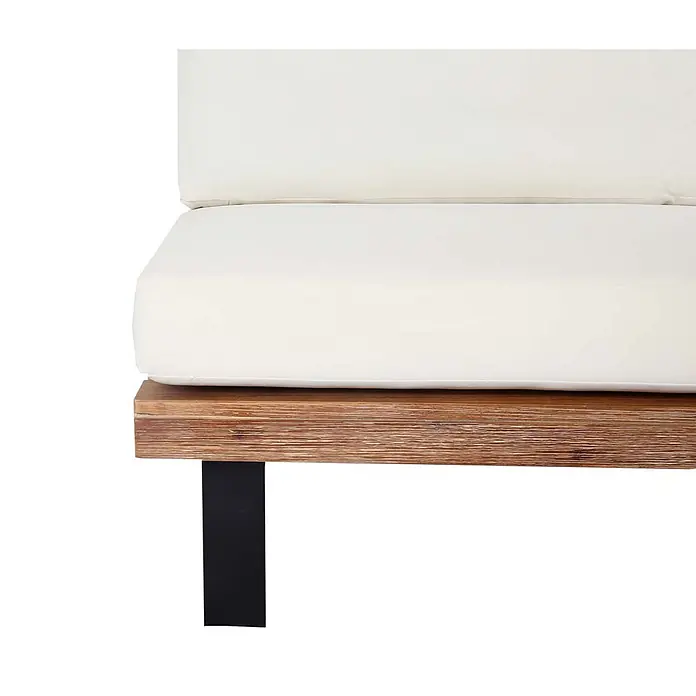 Mendler Garten-Loungesessel HWC-H54 - 1 Stk., Holz, Hellbraun, Polster cremeweiß, B x T x H: 82 x 82 x 75 cm - Cremefarbenes Kissen auf Holzrahmen mit schwarzem Metallfuß, Teil eines modernen Sofas oder Bettes.