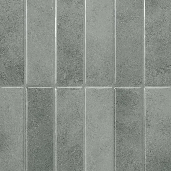 Smart Tiles Selbstklebemosaik Morocco - 29,02 x 22,86 cm, Casa, Glänzend - Strukturierte, graue Rechteckfliesen mit feinen Variationen und helleren Fugen, versetzt angeordnet.
